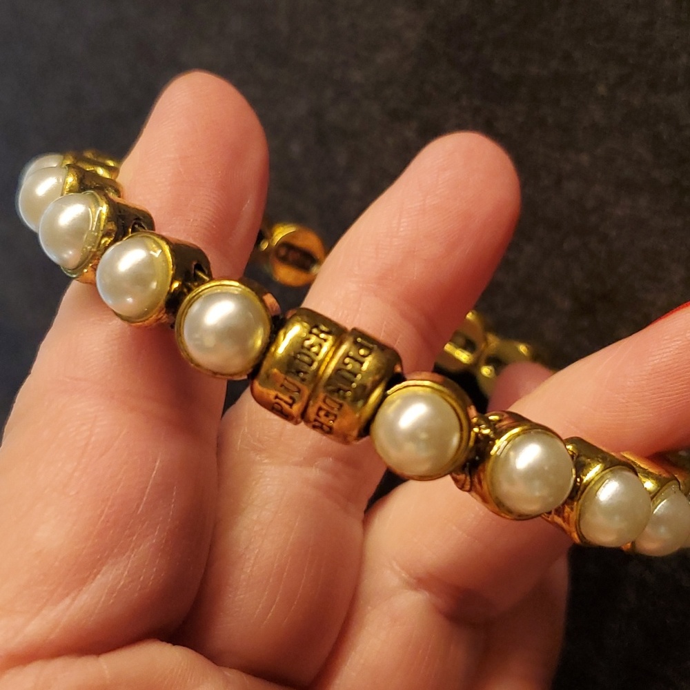 Plunder gold toned magnetic bracelet